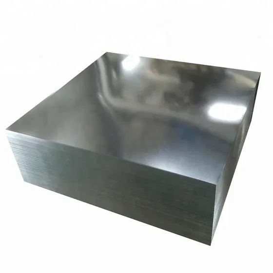 Stack of flat galvanized steel sheets with reflective silver surfaces on a white background