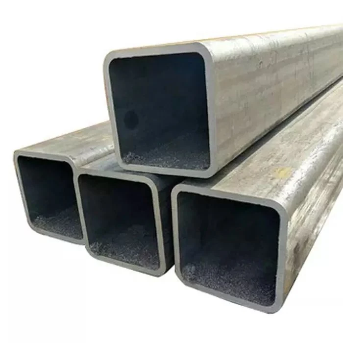 Stacked square steel tubing sections with open hollow ends on a white background