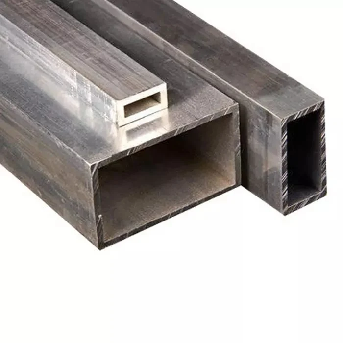 Rectangular hollow metal tubes in three sizes with visible cross-sections on a white background
