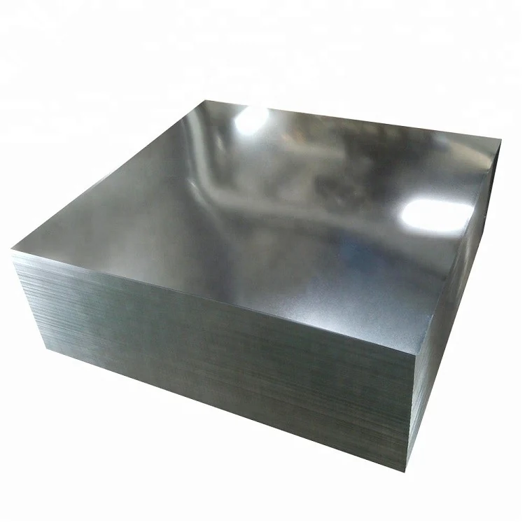 Stack of flat galvanized steel sheets with reflective silver surfaces on a white background