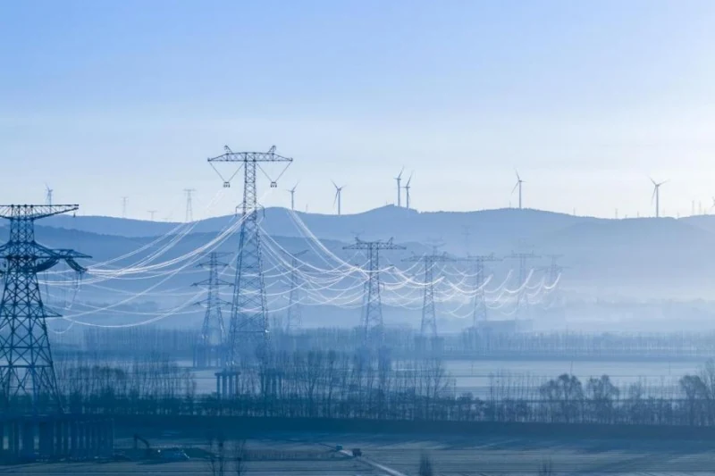 Transmission towers on the Longdong to Shandong ultra high voltage direct current corridor