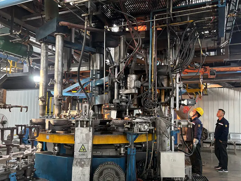 Automated toughened glass insulator production line inside the Jinhao Electrical plant in Linyi Shandong