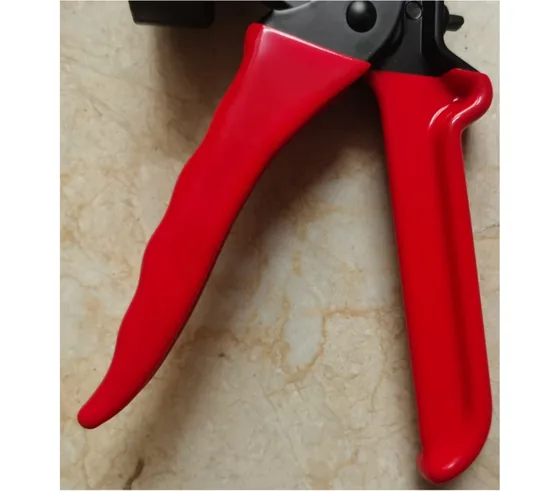 Painted trigger handles after the baking-paint line, checked for coverage and colour match before assembly.