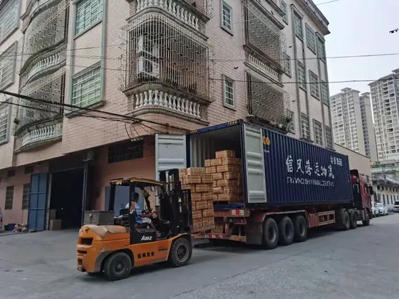 Container loading at the factory door in Jinli Town, Zhaoqing. Cartons are counted against the packing list as