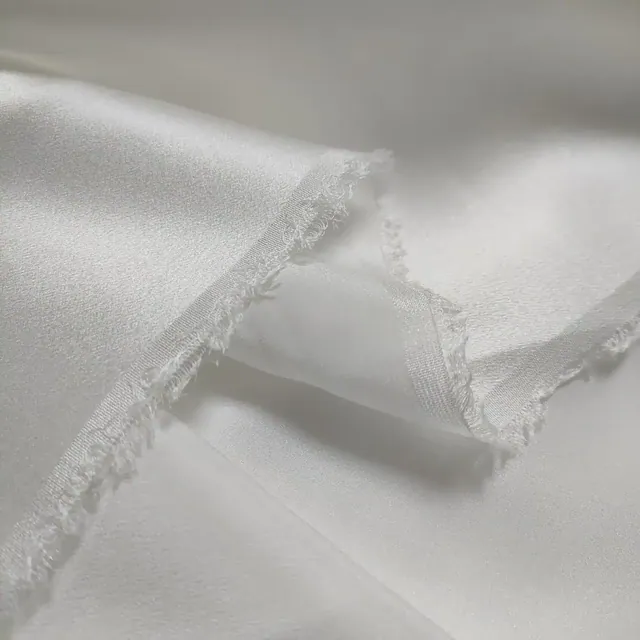 White 12mm Silk Crepe Satin Plain Fabric 45Inch close up