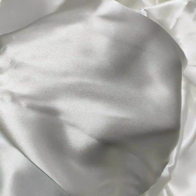 White 22mm Hyaluronic Acid Silk Satin Fabric 45Inch close up