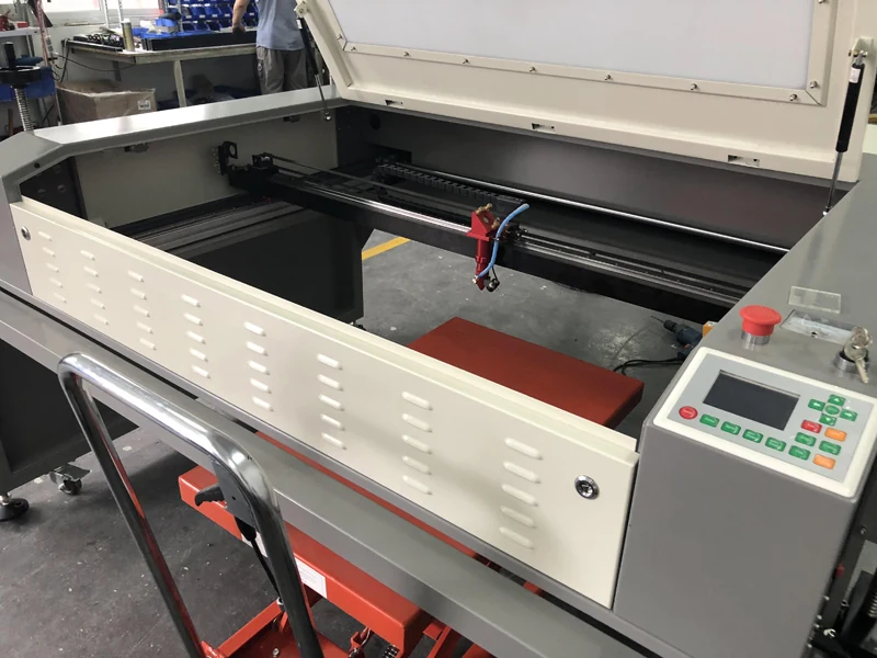 Laser engraver for marble showing the air pressure lifting platform