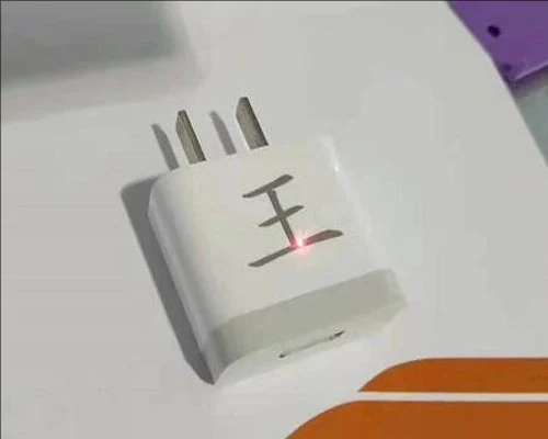 Laser marked graphics on a metal component