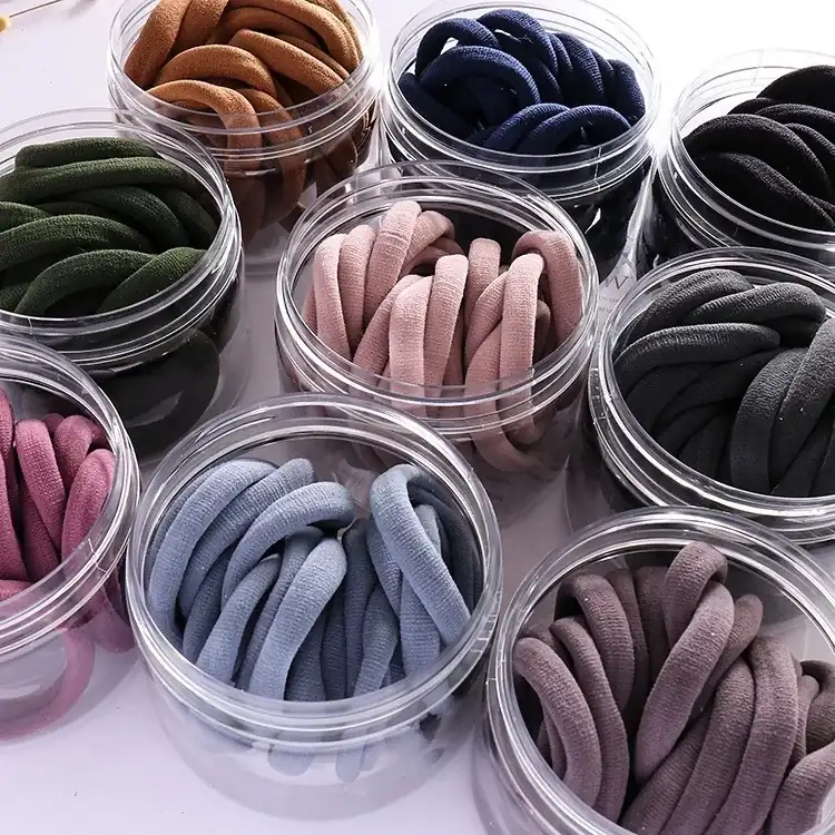 Set of seamless elastic hair ties laid out flat showing the coil construction