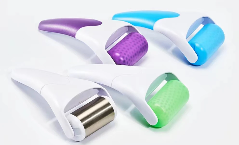 Metal ice roller with smooth polished surface and non-slip handle