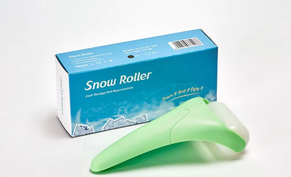 Metal ice roller for skin cooling with smooth polished surface and ergonomic handle