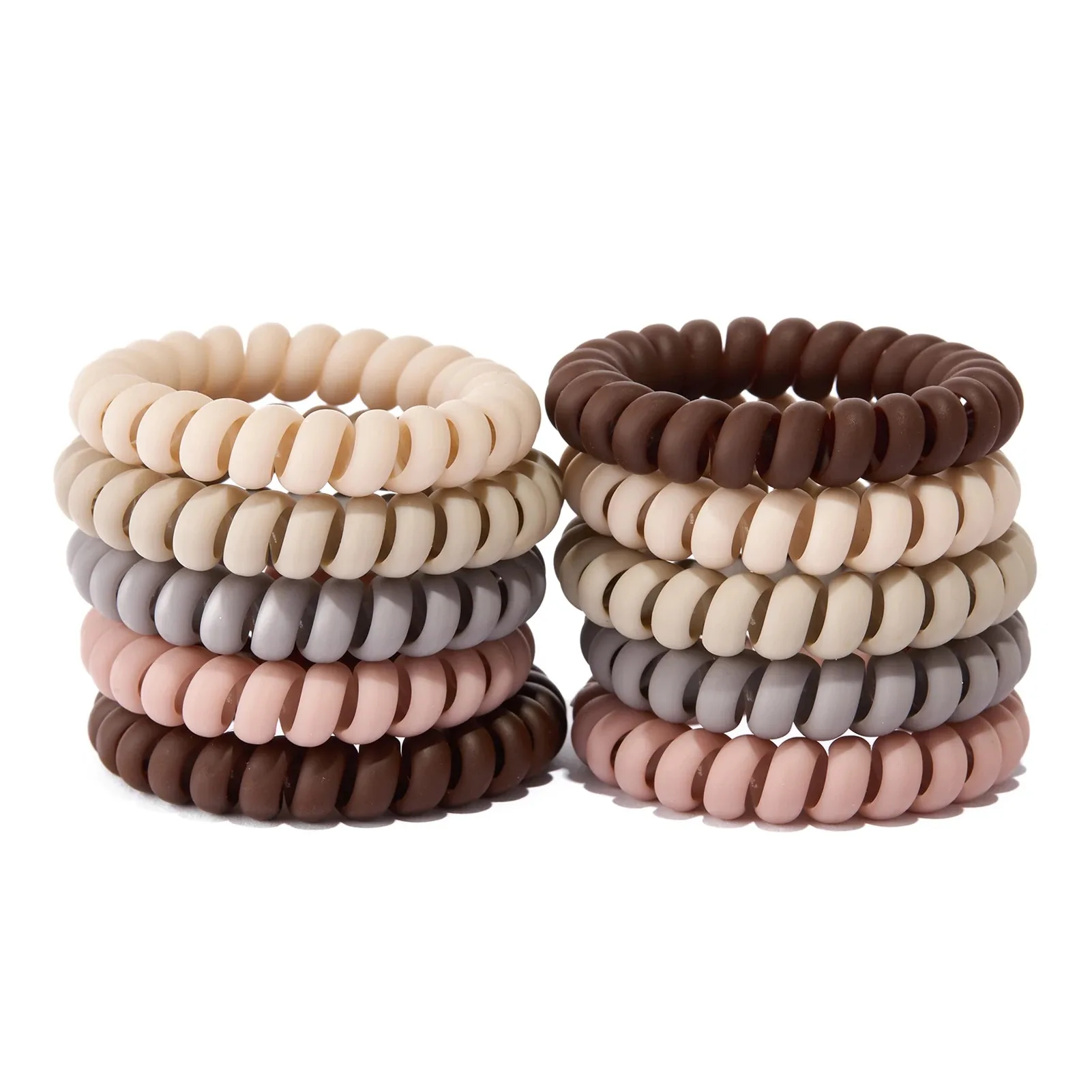 Spiral-shaped TPU hair tie laid flat showing the coiled structure