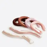 Set of six satin covered heatless hair curler rods laid out flat