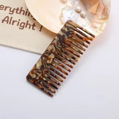 Comb packed in a custom polybag with brand label
