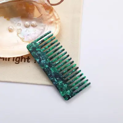 Set of combs in different custom colours on a white background