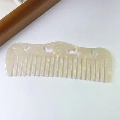 Set of combs in different custom colours arranged side by side