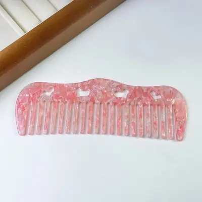 Comb packed in a custom branded polybag with hang tag