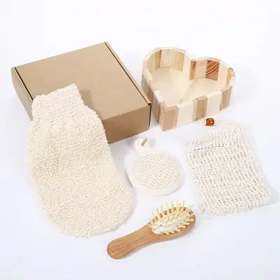 Bath brush and loofah in a travel-friendly fabric pouch