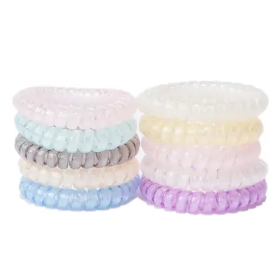 Set of custom-coloured TPU hair ties arranged in a row with different sizes