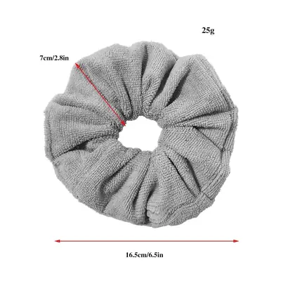Microfiber scrunchie wrapped around a section of hair showing the soft fabric surface