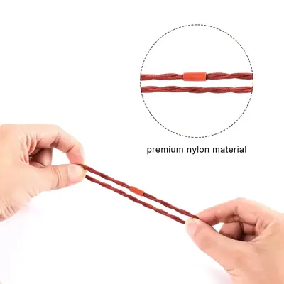 Elastic hair coil tie wrapped around a section of hair demonstrating stretch and hold