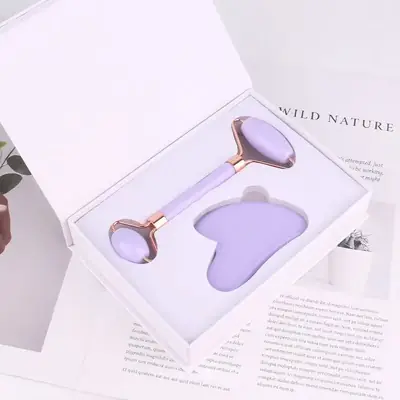 Gua Sha and jade roller set packed in a custom box with brand logo