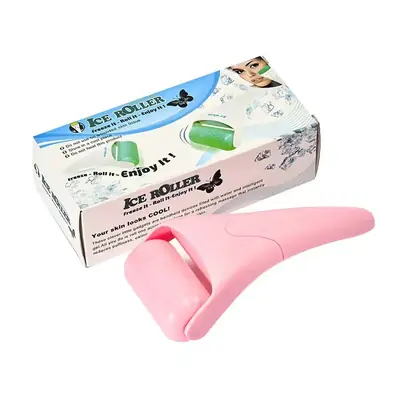 Ice roller placed on a white surface with a clean background