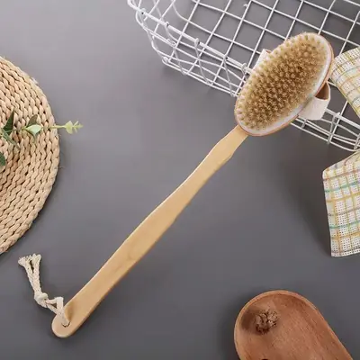 Bath scrubber hung to dry after use, showing natural bamboo texture