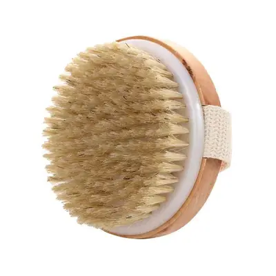 Bath scrubber in use during dry brushing on the arm