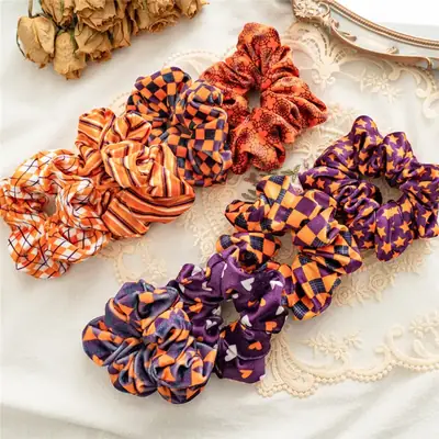 Hair scrunchie worn on a ponytail, showing the soft flannel fabric and secure fit