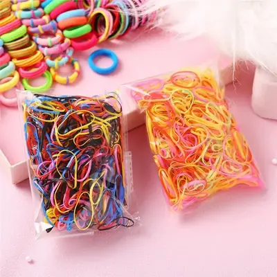 Close-up of a child's hair with a custom-shaped nylon hair tie in place