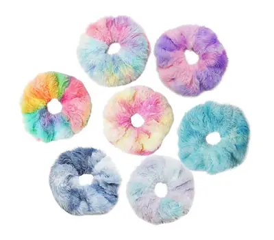 Plush scrunchie wrapped around a section of hair showing soft grip