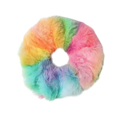 Close-up of the plush fabric edge and hand-stitched seam on a scrunchie