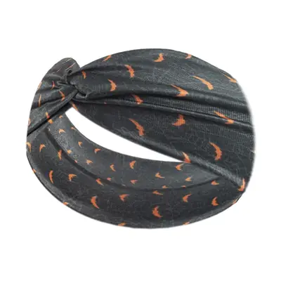 Headband worn on the forehead with hair pulled back, showing the fit and comfort