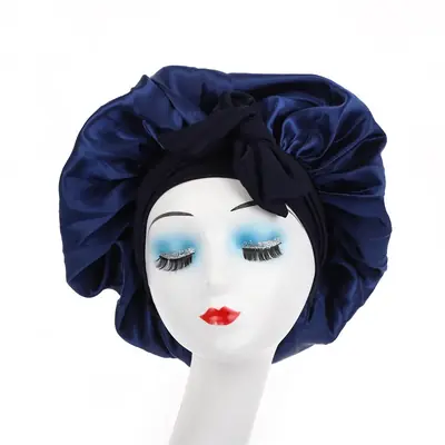 Satin bonnet worn during a shower, showing protection during wet use