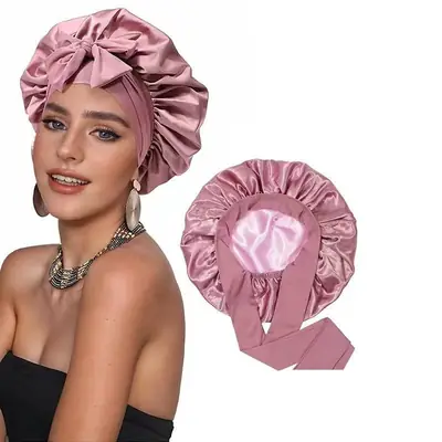 Satin bonnet worn during sleep, showing it stays in place without slipping