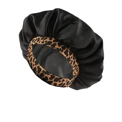Woman wearing the satin bonnet with the elastic band fitted securely around her head