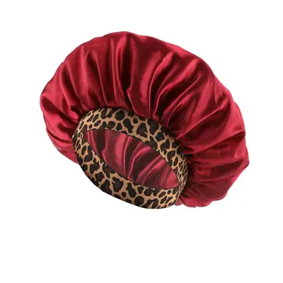 Satin bonnet with wide band and smooth satin surface, ready for retail display