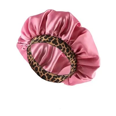 Satin bonnet with leopard pattern and elastic band shown from the side