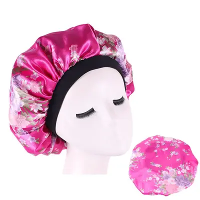 Satin hair bonnet shown on a mannequin with long curly hair covered
