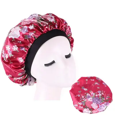 Satin hair bonnet worn during a skincare routine, protecting hair from water
