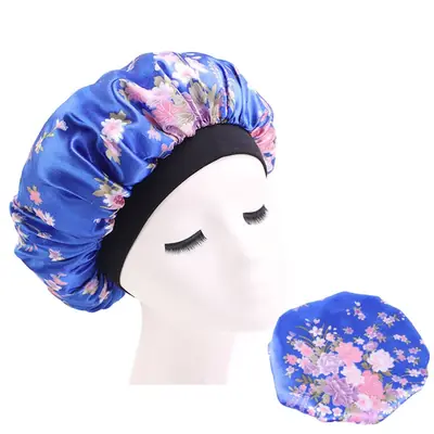 Satin hair bonnet packed in a custom polybag with a branded hang tag