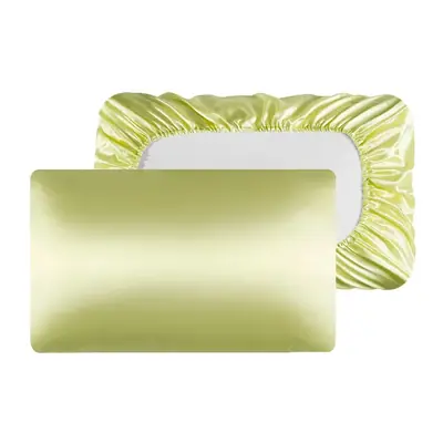 Elastic band opening stretched around a standard pillow to show fit