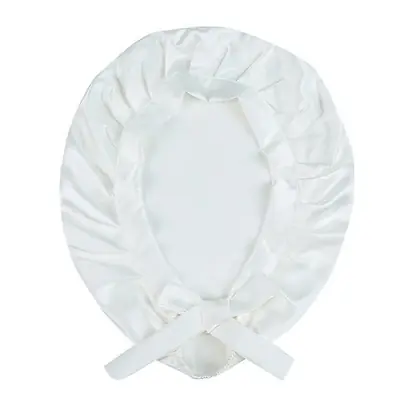 Silk bonnet worn with hair in a low ponytail, showing protection during sleep