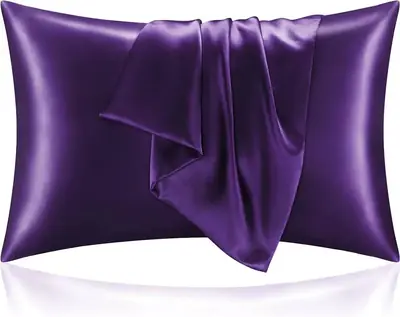 Pillowcase displayed with a matching satin bonnet and eye mask in a gift set