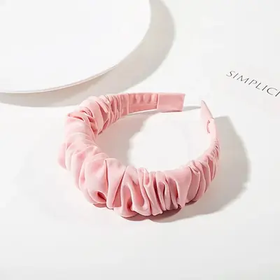 Close-up of the hand-stitched edge on a custom-sized headband
