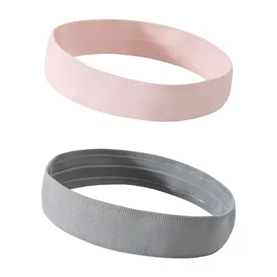 Set of three headbands in different custom colours laid out on a white surface