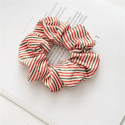 Set of hair bands packed in a custom retail sleeve with branding