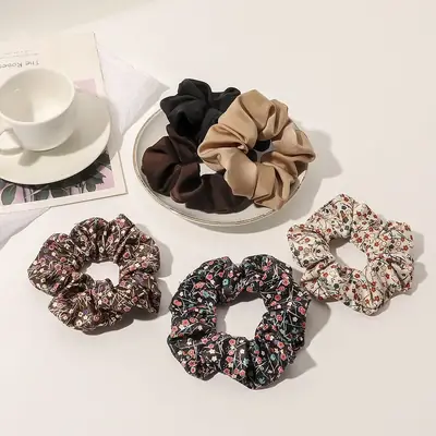 Close-up of the hand-sewn fabric casing on a hair scrunchie