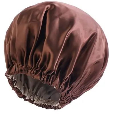 Bonnet worn during a skincare routine with hair fully covered